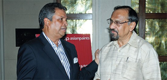 Binod Chaudhary, President Chaudhary Group interacting with Prof. Dr. Bishwambher Pyakuryal, a well known Economist during the Conclave