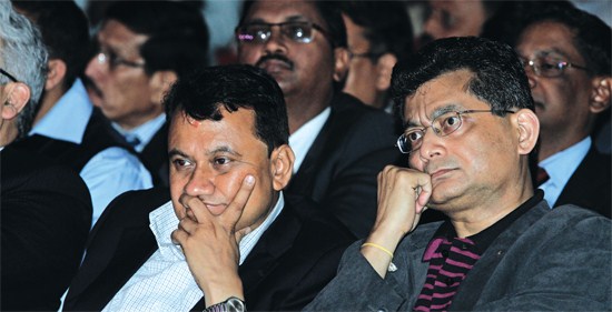Industry secretary Krishna Gyawali & CEO of NIC Asia Bank Sashin Joshi listening to the speakers