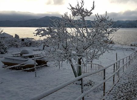 Snow-Covered Rara Offers Majestic View to Tourists   