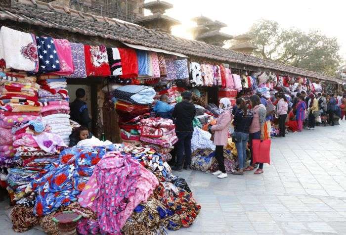 Customers buying warm clothes at Makhan tole of Kathmandu. Photo: Pradeep Luintel/Aarthik Abhiyan