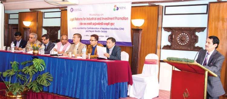Chairman of New Business Age, Madan Lamsal, speaks at a programme entitled Reforms for Industrial and Investment Promotion in Nepal on Wednesday. Participants of the programme stressed on reforming laws for the development of industries and investment-friendly environment in the country. Photo: Aarthik Abhiyan