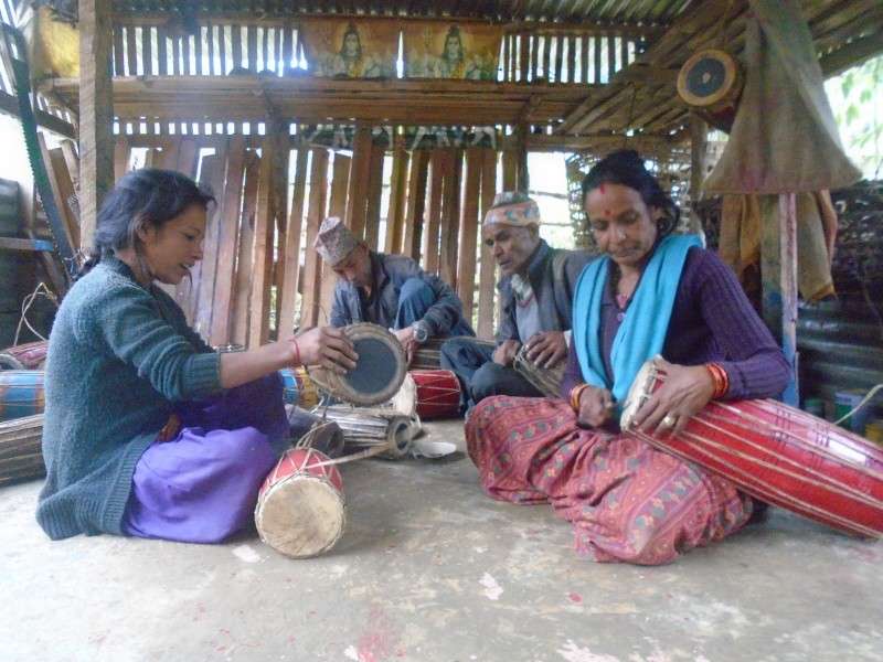 Workers manufacturing musical instrument locally known as madal at a factory in Simritu Bazar of Triveni Municipality. Members of the Badi community took the initiative to open this factory about two years ago. Photo: Pradeep Dalel/Aarthik Abhiyan