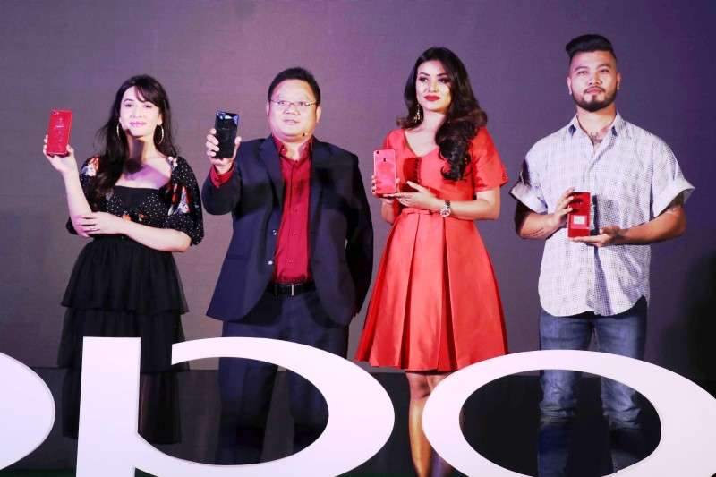 This handout photo shows actress Aditi Budhathoki (left) and former Miss Nepal Joshi Malina (second right) unveil Oppo F7 amid a function in the capital on Wednesday. 