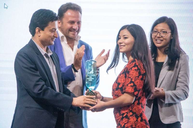 Prasansha KC receives the Wai-Wai Glocal Teen Hero 2018 Award during a recent function at Hotel Soaltee. Photo: Pradip Luitel/NBA 