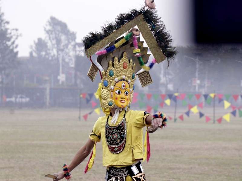 A participant dressed as a 'Lakhe' performs during the Democracy Day parade at Tundikhel in Kathmandu on Tuesday. Photo: Pradeep Kumar Shrestha/NBA